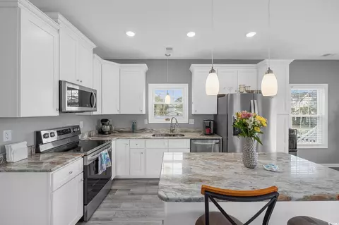 Kitchen - 614 S Willow Dr, Surfside Beach, SC 29575 photo 2 of 5