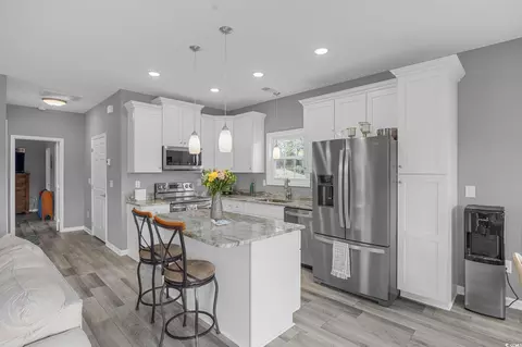 Kitchen - 614 S Willow Dr, Surfside Beach, SC 29575 photo 3 of 5