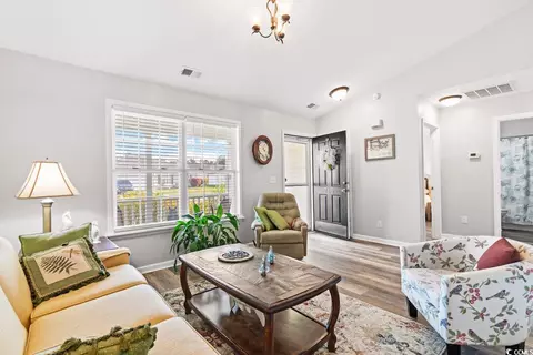 Living - 715 Alexis Dr, Longs, SC 29568 photo 3 of 5