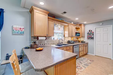 Kitchen - 1903 Shell Ct, Surfside Beach, SC 29575 photo 3 of 4