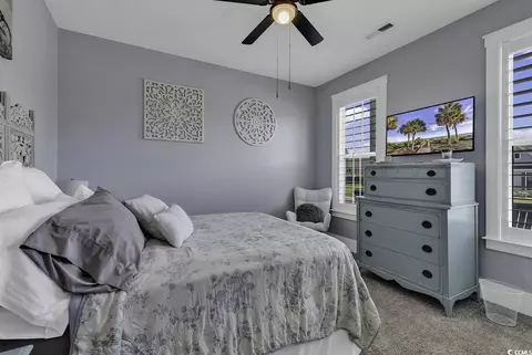 Bedroom - 668 Pacific Commons Dr, Surfside Beach, SC 29575 photo 3 of 9