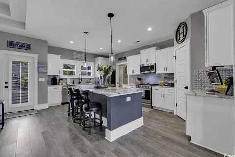 Kitchen - 668 Pacific Commons Dr, Surfside Beach, SC 29575 photo 2 of 4