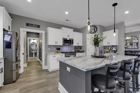 Kitchen - 668 Pacific Commons Dr, Surfside Beach, SC 29575 photo 3 of 4