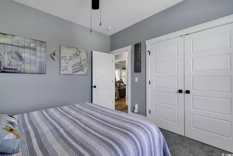 Bedroom - 668 Pacific Commons Dr, Surfside Beach, SC 29575 photo 6 of 9