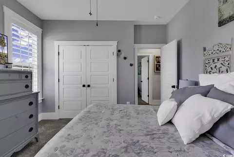Bedroom - 668 Pacific Commons Dr, Surfside Beach, SC 29575 photo 4 of 9
