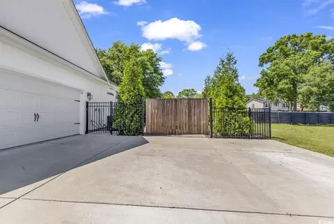 Exterior - 668 Pacific Commons Dr, Surfside Beach, SC 29575 photo 8 of 10