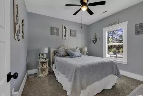 Bedroom - 668 Pacific Commons Dr, Surfside Beach, SC 29575 photo 1 of 9