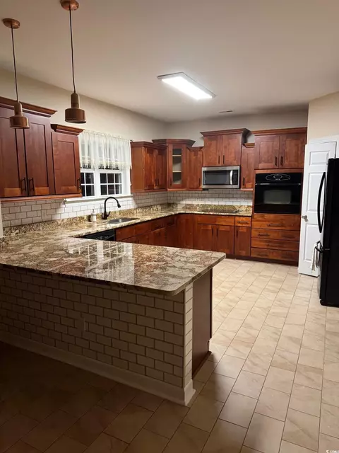 Kitchen - 234 Sugar Mill Loop, Myrtle Beach, SC 29588 photo 3 of 4