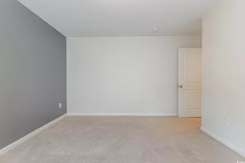 Bedroom - 160 Ocean Commons Dr, Surfside Beach, SC 29575 photo 7 of 7