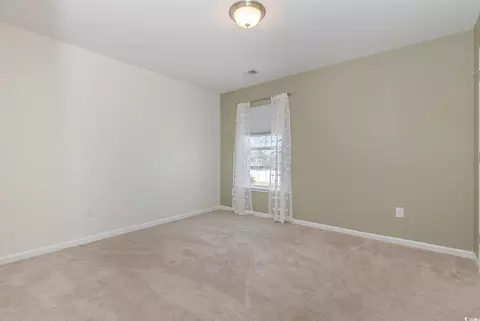 Bedroom - 160 Ocean Commons Dr, Surfside Beach, SC 29575 photo 4 of 7