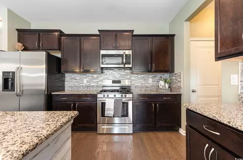 Kitchen - 160 Ocean Commons Dr, Surfside Beach, SC 29575 photo 2 of 3