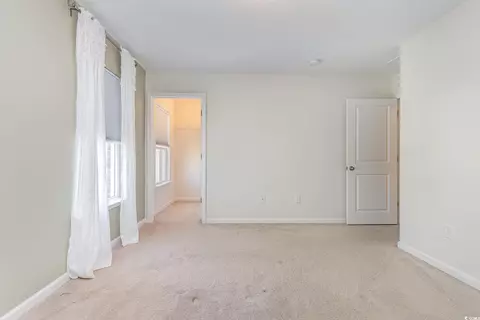 Bedroom - 160 Ocean Commons Dr, Surfside Beach, SC 29575 photo 5 of 7