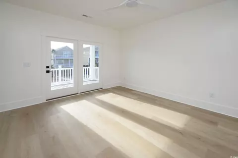 Bedroom - 220 16th Ave S, Surfside Beach, SC 29575 photo 1 of 9