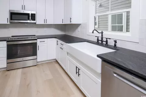 Kitchen - 220 16th Ave S, Surfside Beach, SC 29575 photo 3 of 4