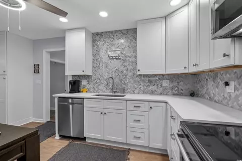 Kitchen - 613 Cypress Dr, Surfside Beach, SC 29575 photo 4 of 5