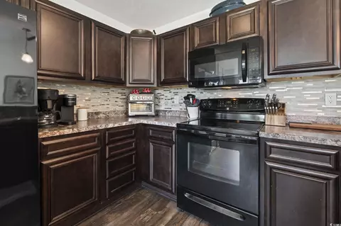 Kitchen - 313 Palladium Dr, Surfside Beach, SC 29575 photo 3 of 3