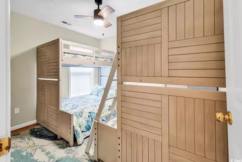 Bedroom - 17 S Oak Dr, Surfside Beach, SC 29575 photo 5 of 9