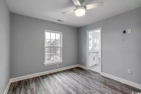 Bedroom - 723 10th Ave S, Surfside Beach, SC 29575 photo 3 of 4