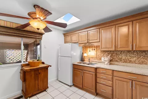 Kitchen - 503 Plantation Dr, Surfside Beach, SC 29575 photo 2 of 3