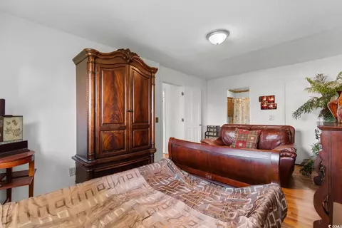 Bedroom - 503 Plantation Dr, Surfside Beach, SC 29575 photo 2 of 4