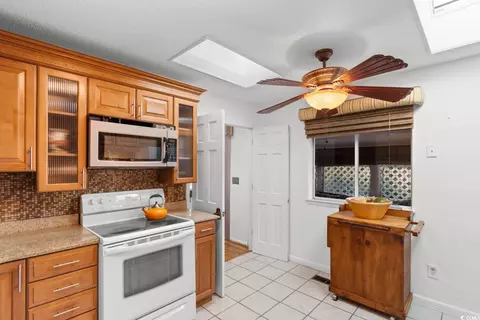 Kitchen - 503 Plantation Dr, Surfside Beach, SC 29575 photo 3 of 3