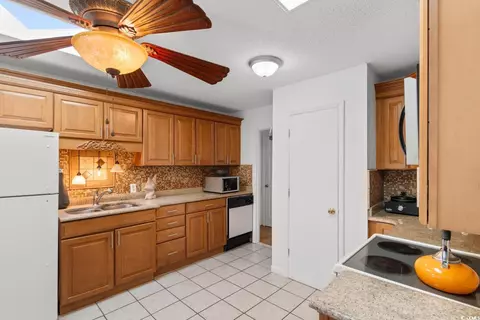 Kitchen - 503 Plantation Dr, Surfside Beach, SC 29575 photo 1 of 3