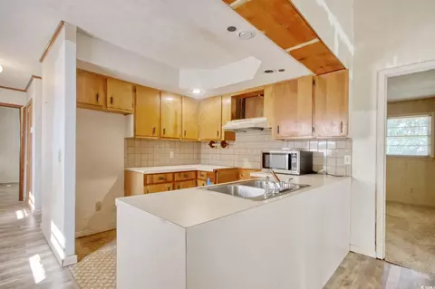 Kitchen - 713 C 3rd Ave S, Surfside Beach, SC 29575 photo 2 of 2