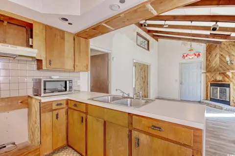 Kitchen - 713 C 3rd Ave S, Surfside Beach, SC 29575 photo 1 of 2