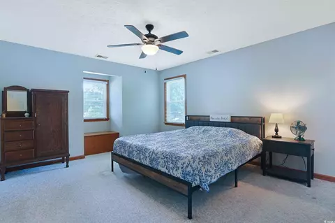 Bedroom - 1601 Dick Pond Rd, Surfside Beach, SC 29575 photo 1 of 7