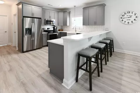 Kitchen - 112 7th Ave N # -A, Surfside Beach, SC 29575 photo 2 of 3