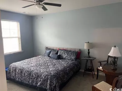 Bedroom - 191 Ocean Commons Dr, Surfside Beach, SC 29575 photo 5 of 6