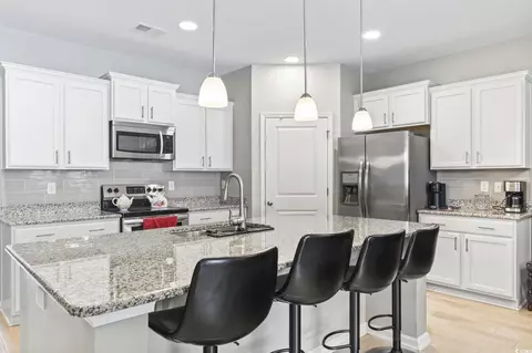 Kitchen - 191 Ocean Commons Dr, Surfside Beach, SC 29575 photo 4 of 7