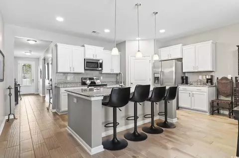 Kitchen - 191 Ocean Commons Dr, Surfside Beach, SC 29575 photo 3 of 7