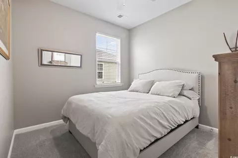 Bedroom - 191 Ocean Commons Dr, Surfside Beach, SC 29575 photo 3 of 6