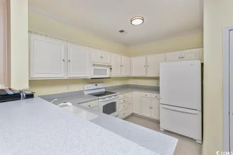 Kitchen - 750 Charter Dr #E7, Longs, SC 29568 photo 3 of 4