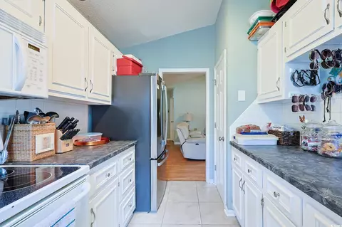 Kitchen - 412 Cypress Dr, Surfside Beach, SC 29575 photo 2 of 3
