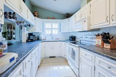 Kitchen - 412 Cypress Dr, Surfside Beach, SC 29575 photo 1 of 3