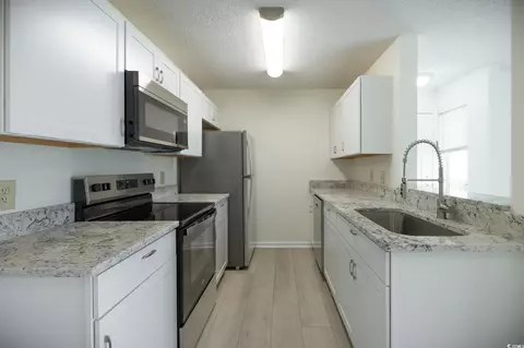 Kitchen - 8925 Duckview Dr #A, Surfside Beach, SC 29575 photo 3 of 3