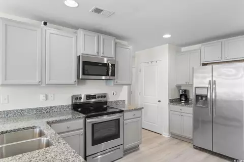 Kitchen - 517 Mossbank Loop, Longs, SC 29568 photo 2 of 4