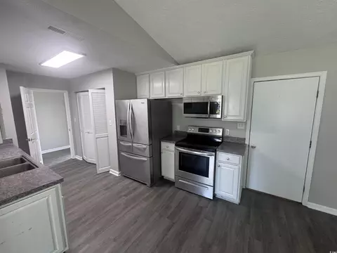 Kitchen - 574 Circle Dr, Surfside Beach, SC 29575 photo 2 of 3