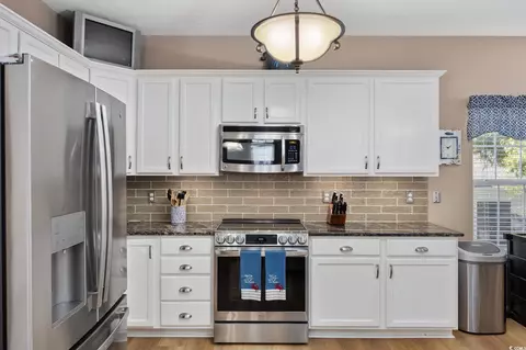 Kitchen - 21 Palmas Dr, Surfside Beach, SC 29575 photo 3 of 5