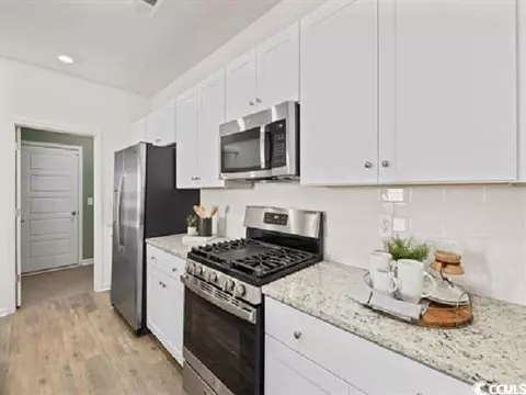 Kitchen - 900 Blacksmith Dr, Loris, SC 29569 photo 2 of 2