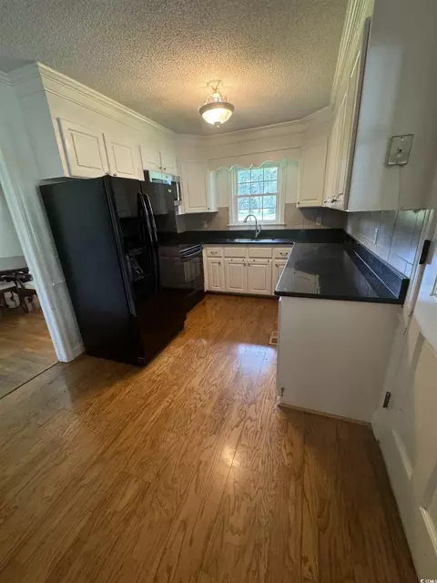 Kitchen - 314 Pine St, Latta, SC 29565 photo 2 of 2