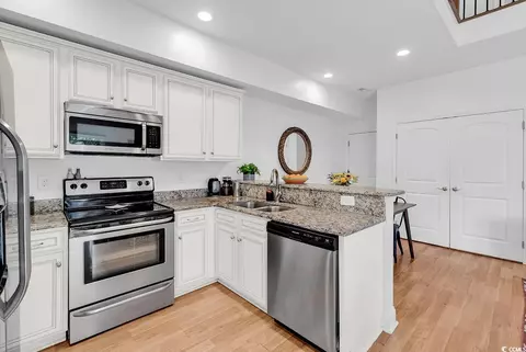 Kitchen - 327 Ab Sparrow Dr, Surfside Beach, SC 29575 photo 2 of 3