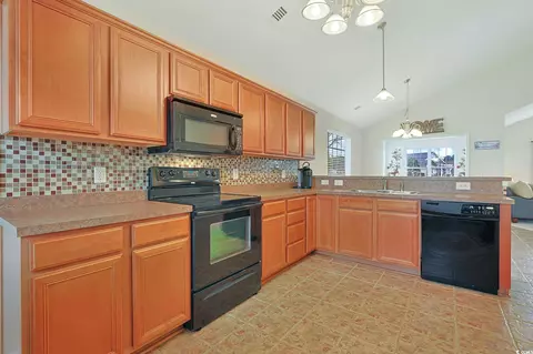 Kitchen - 208 Sutter Dr, Surfside Beach, SC 29575 photo 2 of 2