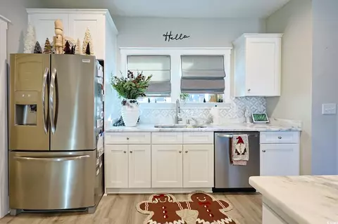 Kitchen - 669 Pacific Commons Dr, Surfside Beach, SC 29575 photo 3 of 4