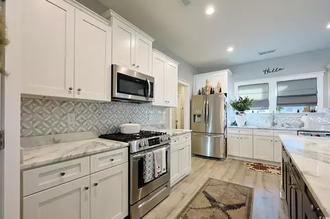Kitchen - 669 Pacific Commons Dr, Surfside Beach, SC 29575 photo 2 of 4