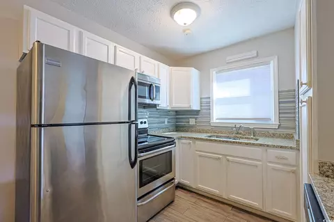 Kitchen - 718 Juniper Dr, Surfside Beach, SC 29575 photo 2 of 2