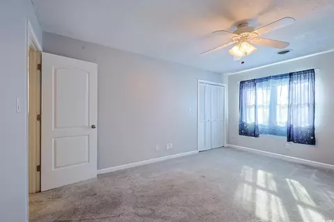 Bedroom - 718 Juniper Dr, Surfside Beach, SC 29575 photo 2 of 3