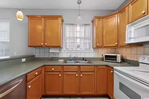 Kitchen - 113 7th Ave Apt A 7th Ave S, Surfside Beach, SC 29575 photo 1 of 2